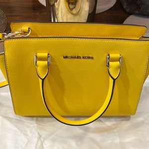 Michael Kors Saffiano yellow handbag. Never been used.